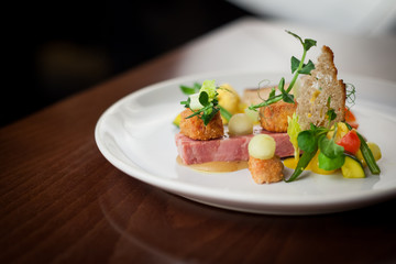 Ham hock with seasonal vegetable salad