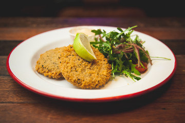Fish cakes with salad