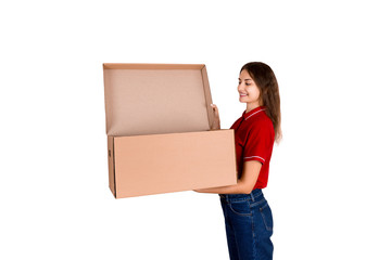 Smiling delivery woman is looking into open cardboard box, post delivery concept , isolated on white background
