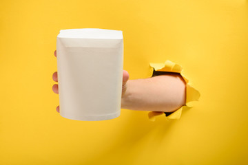 Hand taking a wok box