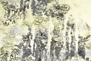 yellow big cracks on weathered stucco texture - cute abstract photo background
