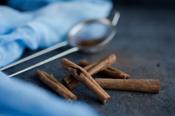 Cinnamon sticks on black background