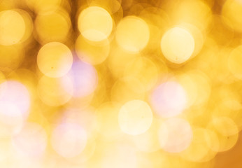 Golden bokeh lights as abstract background