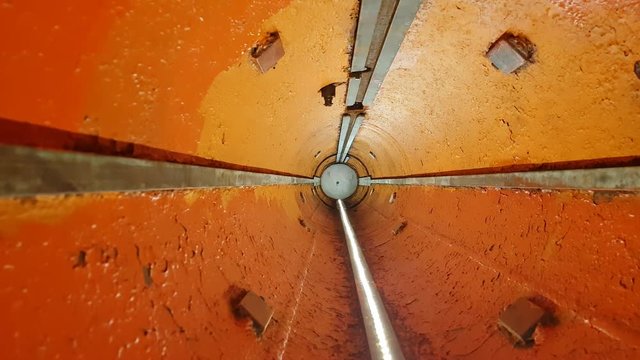Motion in red painted tube