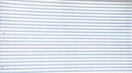 Obraz premium A slatted white window blind image for background use with copy space