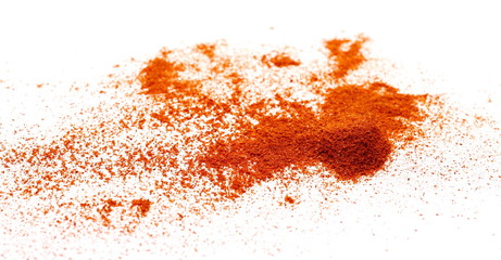 Red paprika powder pile isolated on white background