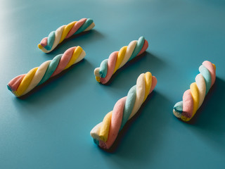 Candies with cloud shape on a blue background