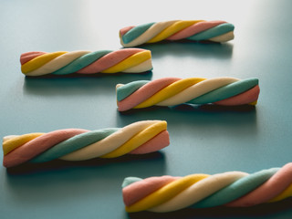 Candies with cloud shape on a blue background