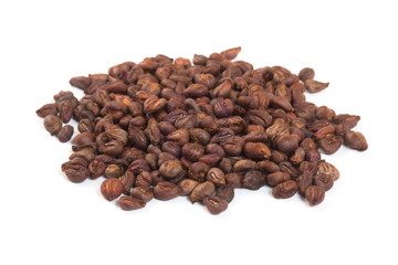 Stack of dried grape seeds isolated on white background