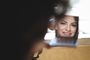 woman with mirror for make up