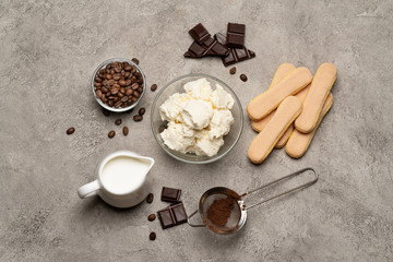 Ingredients for cooking tiramisu - Savoiardi biscuit cookies, mascarpone, cream, sugar, cocoa, coffee and egg