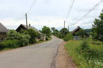 Fototapeta na wymiar Road and old houses