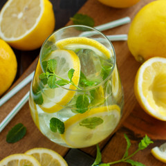 Homemade refreshing drink with lemon juice and mint