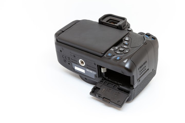 digital camera with open battery compartment