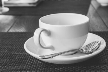 cup of coffee on wooden table