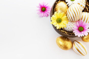 Gift card with colorful easter eggs and camomiles.