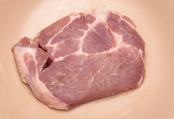 Raw pork chop meat
