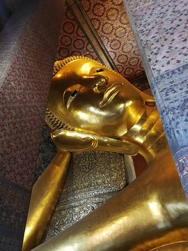 Golden Buddha image in Wat Pho, Bangkok/ Thailand