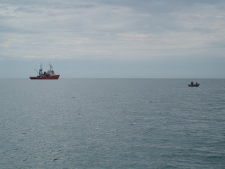 boat in the sea sea horizon the fishermen and the ship