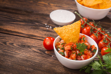 Mexican tomato salsa with tortilla chips