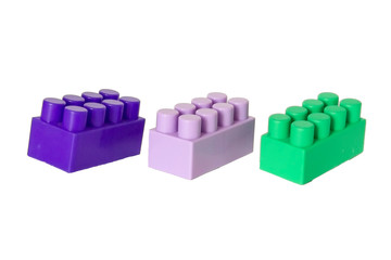 details of a children's plastic constructor on a white background. colored cubes. block.