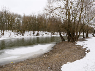 the beginning of spring. the river is free of ice.