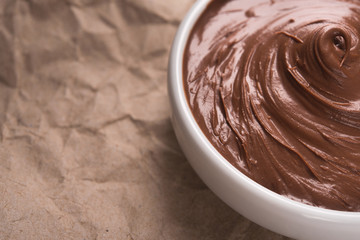 White bowl with chocolate cream