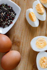 Hard boiled egg on wooden background