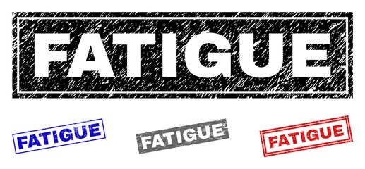 Grunge FATIGUE rectangle stamp seals isolated on a white background. Rectangular seals with distress texture in red, blue, black and gray colors.