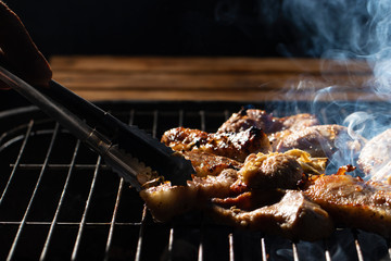 Grilled pork on the grill ,smoke