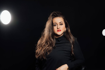 Naklejka premium Portrait beautiful woman on black background.