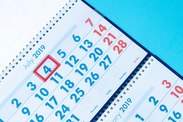 hand points to holidays in the calendar 4 july