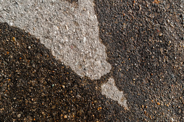 Wet asphalt road after the rain. Asphalt background. Background and texture. Wet asphalt texture. Wet and dry