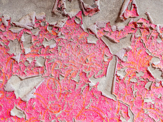 Abblättern einer Alten rosa Hauswand