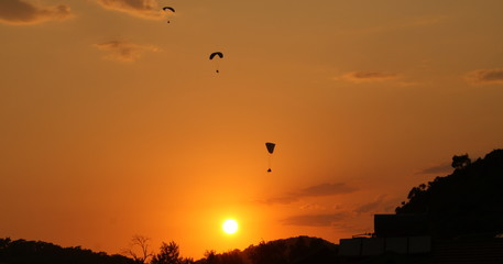 Paragliding as Morning Breaks