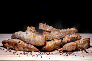 Grilled pork on the grill ,smoke
