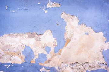 Eine alte blaue brüchige Fassade Mauer als Hintergrund