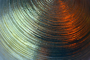 Obraz premium metal surface with concentric circular grooves glare with highlights fragment
