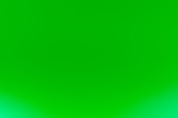 Texture in a bright, green color illuminated with a delicate light.