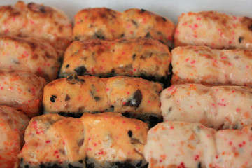 Sushi roll sets in take away box. Baked salmon and eel unagi rolls, modern japanese food delivery. Asian cuisine menu seafood options, tasty freshly cooked hot sushi close up view