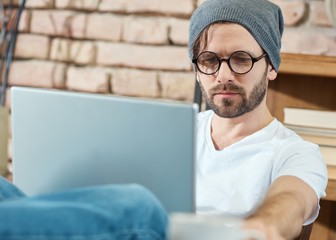 Young man using laptop computer