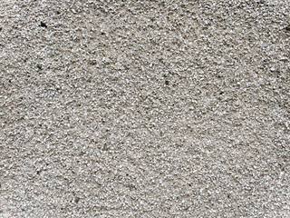 decorative plaster with stone sprinkling. background texture
