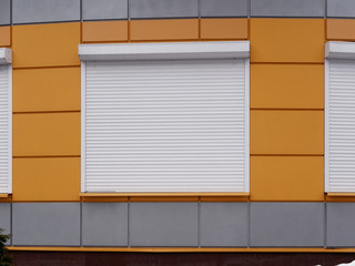 modern exterior design of an office building. roller shut window