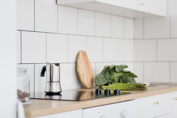 White kitchen with classic tiles