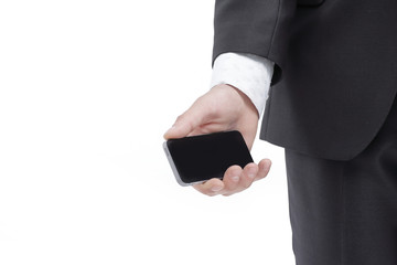 close up.businessman holding a cell phone.photo with copy space