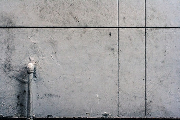 コンクリートの壁と配管