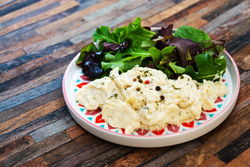 Traditional Parmentier of fish with chives