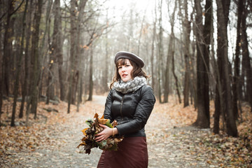  Woman Holding Dry Leaves In Hands
