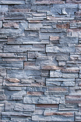 full frame photo of a grey stone wall