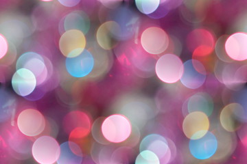 Multicolored blurry lights bokeh defocused abstract background for Christmas new year and celebration events